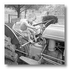 Young Tyler on 9N Tractor Image